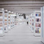 white wooden shelf with books