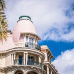 Ornate building with pink dome against blue sky